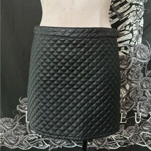 Black quilted faux leather skirt